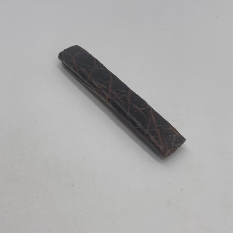 Barra de clip de corbata vintage de cuero tono dorado para hombre Foto 2 de 4