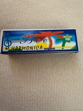 Harmonica. Bee Harmonica Never Used. Musical instrument. 024 