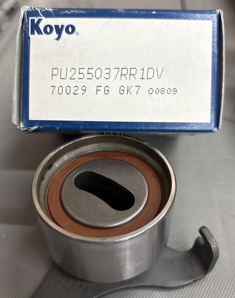 Rodamiento tensor de rodillos de correa de distribución OEM KOYO PU255037RR1DV para Toyota Tercel BE Foto 2 de 2