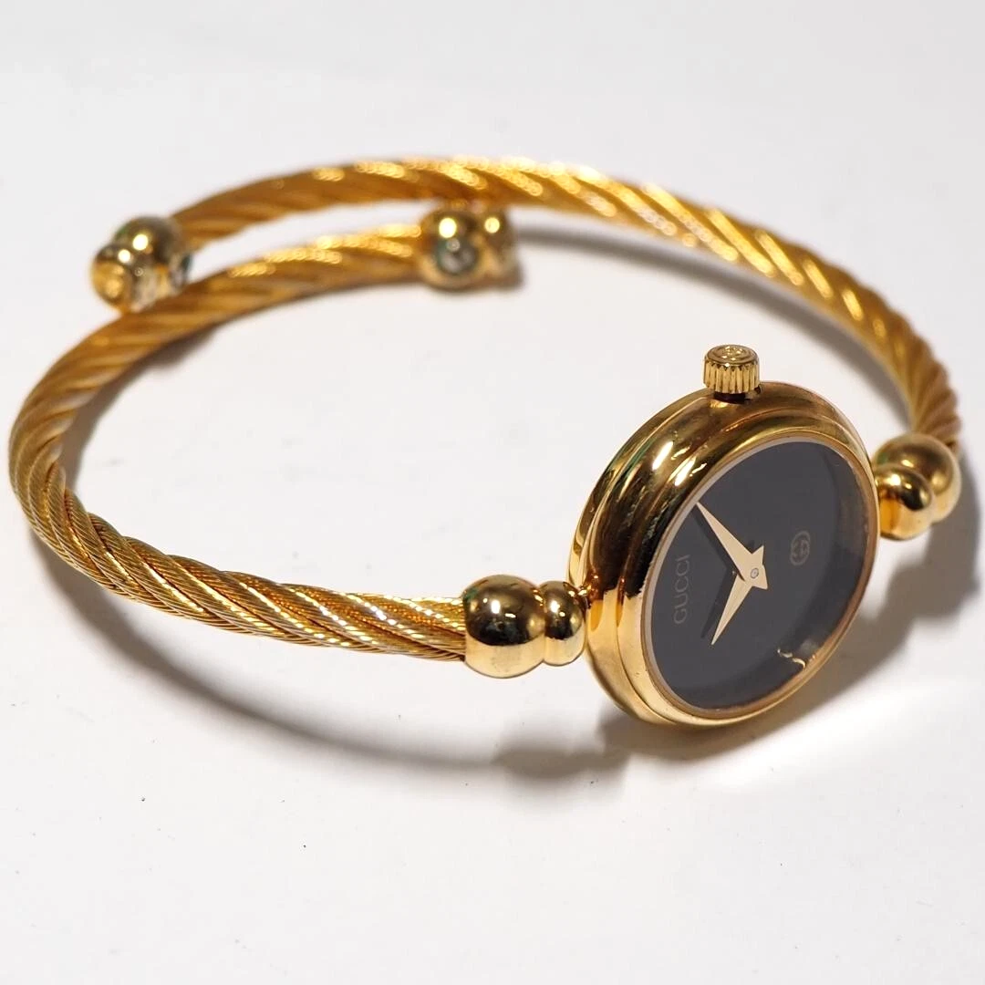 Bracelet montre femme Gucci cadran coquillage doré noir suisse vintage authentique 2700L