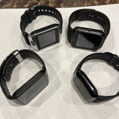 Adult Smart Watch Lot Of 4 Black And Silver( Sold Untested, Lost Chargers) 