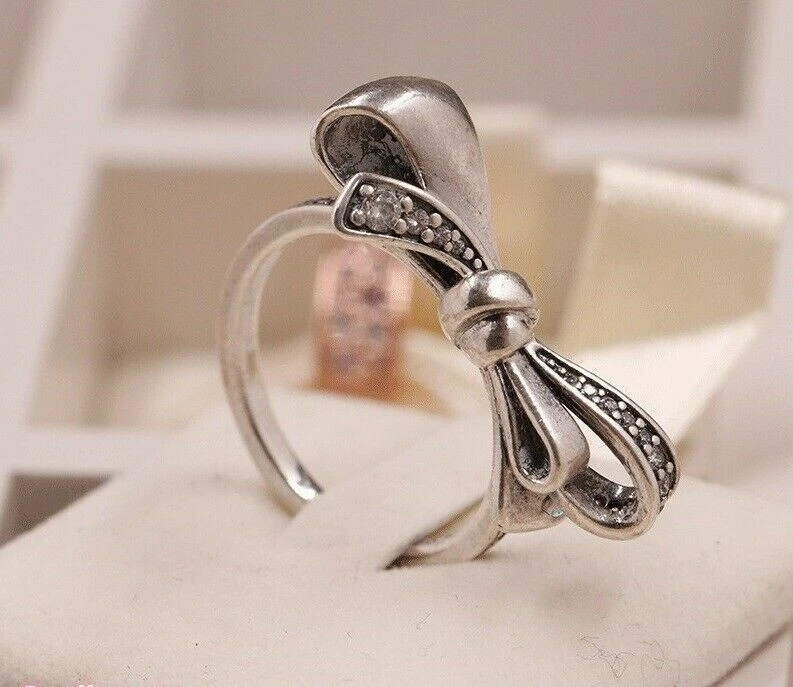 Delicate bow best sale ring