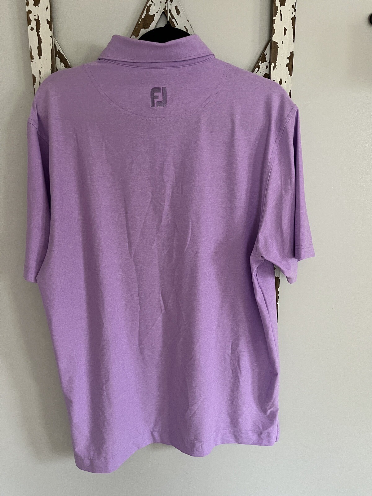 FootJoy Polo size medium light purple EUC logo on sleeve as shown in photo