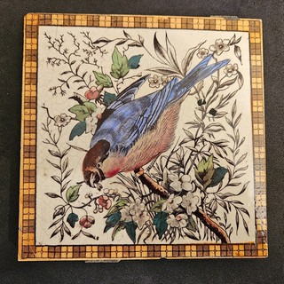 Vintage or Antique TILE featuring an image of a bird