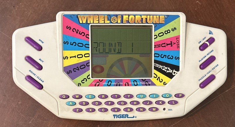 Vintage 1995 Wheel of Fortune Tiger Electronics Handheld W/Cartridge Works
