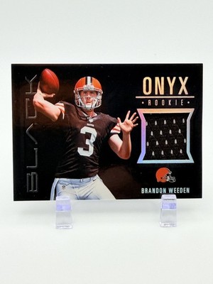 2012 Panini Black - Onyx Rookie Materials Brandon Weeden #6 /299 (MEM, RC)
