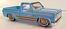 HOT WHEELS 2025 CUSTOM 83 CHEVY SILVERADO BLUE WITH LEXANI RX ALLOY WHEELS NEW
