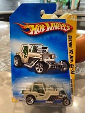 2009 Hot Wheels #27 New Models 27/42 CUSTOM '42 JEEP CJ-2A Tan Variant w/UT5 Sp
