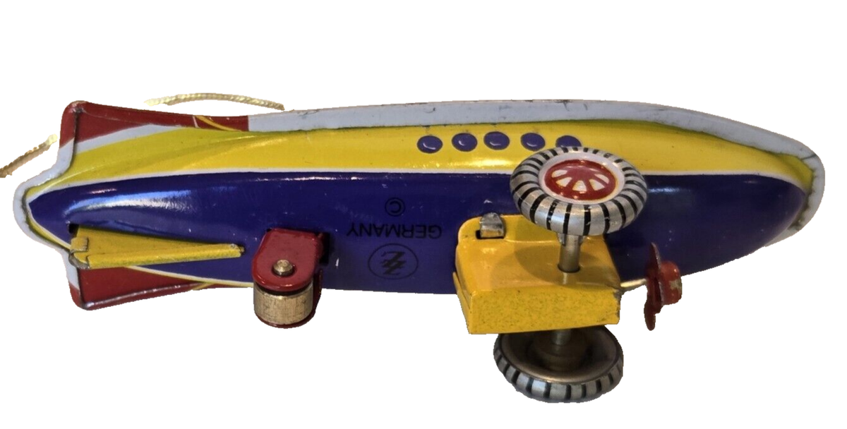Tin Graf Zeppelin Toy Ornament Germany Moving Wheels and Propeller