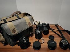 Canon T50 Camera With Various Lenses And Travel Bag UNTESTED