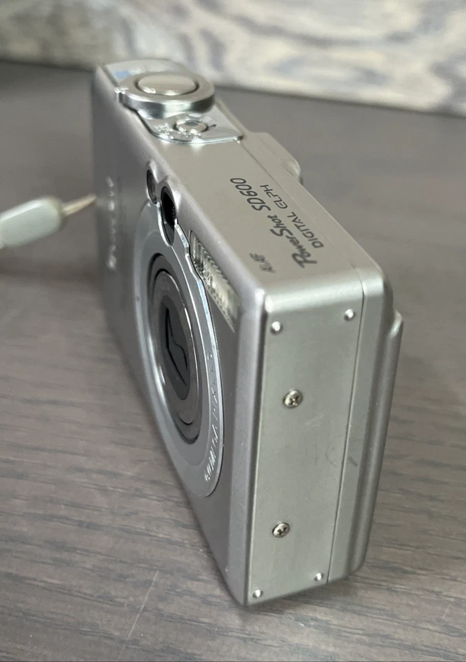 Paquete de cámara digital Canon PowerShot ELPH SD600 6,0 MP Foto 4 de 4