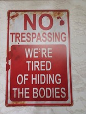 HUMOROUS NO TRESPASSING..WE'RE TIRED OF HIDING THE BODIES METAL SIGN