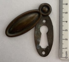 Vintage Brass Door Keyhole Cover Escutcheon, circa 1900s.