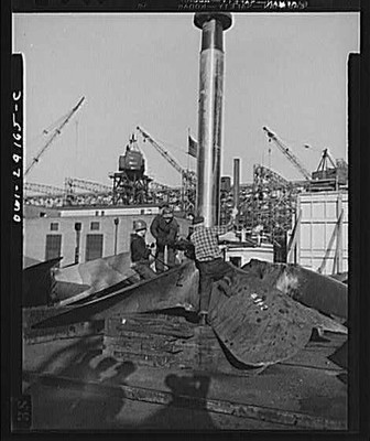 Photo:Shipyard Workers Crane Industrial Construction 1940s Dockyard