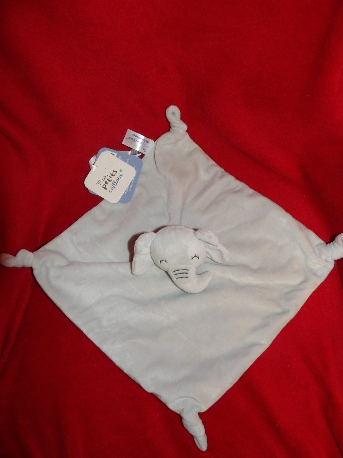 Doudou plat éléphant gris Mes Petits Cailloux, cadeau de naissance idéal en coton