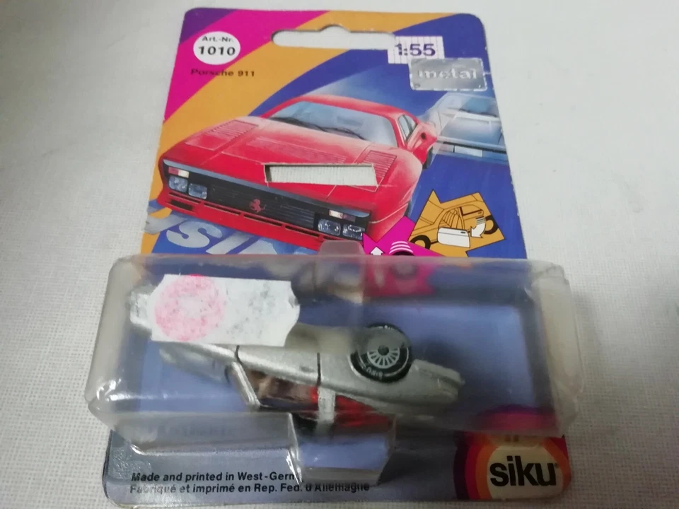 SIKU 1010 PORSCHE 911 ARGENTO METALLIZZATO CAPOVOLTO ERRORE DI FABBRICA RARO - Immagine 3 di 4