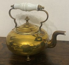Antique Brass Tea Pot With White Ceramic / Porcelain Handle On 3 Feet.