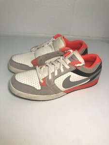 black and peach nike shoes