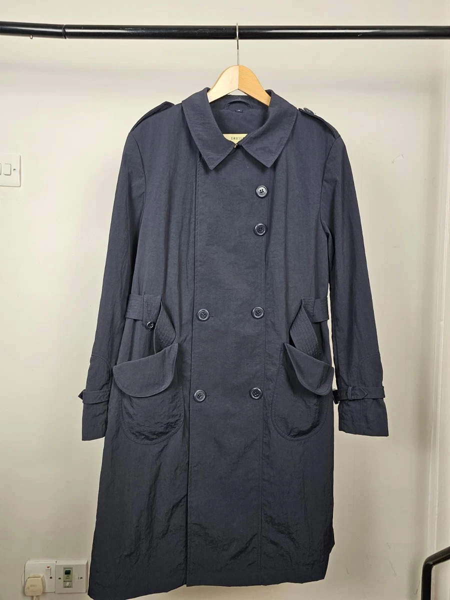 Veste matelassée de couleur argent avec fermeture éclair