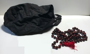 Hare Krishna dark prayer beads and black bag Prabhupada Hindu religious Shelter