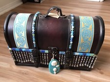 vintage leather chest with decorative turquoise and Jade