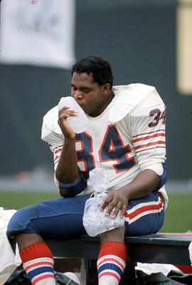 Jim Braxton Buffalo Bills ices his knee while sitting on the benc- 1974 Photo 1