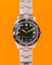 STICKERED Oris Divers Sixty Five 40mm 01 733 7707 4357 Green Dial Bronze & Stain