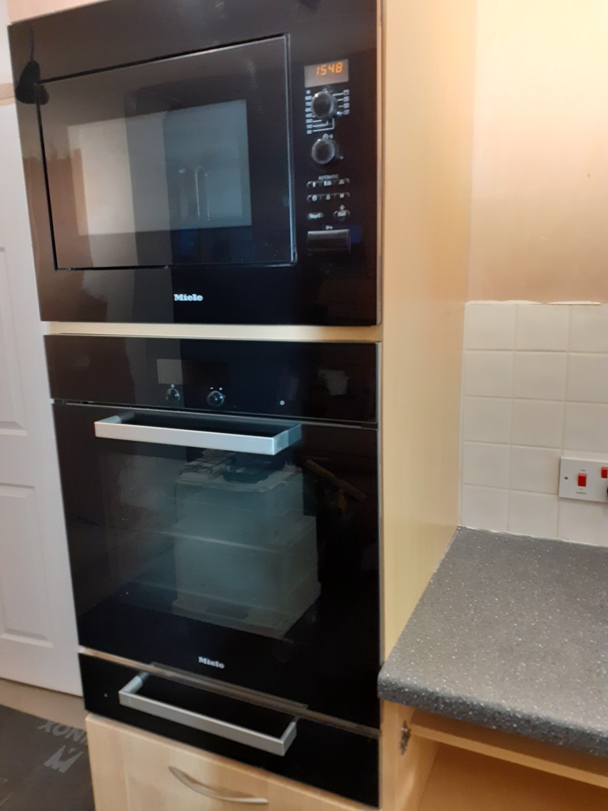 Miele built-in oven, microwave, warming draw, hob & extractor fan