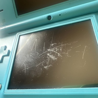 Nintendo DSi Light Blue Handheld Console Game System with Charger and Stylus