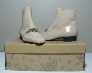 nude patent leather booties