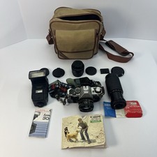 Canon AE-1 35mm SLR Film Camera with Canon 50mm f/1.8 FD Lens  Extras