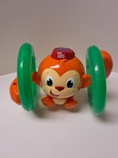 Bright Starts Roll Glow Monkey Crawling Baby Toy With Lights Sounds
