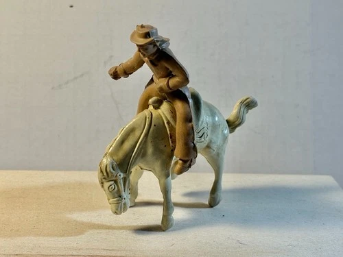 Marx 1950's 60mm plastic Chubby Cowboy on bucking bronco.