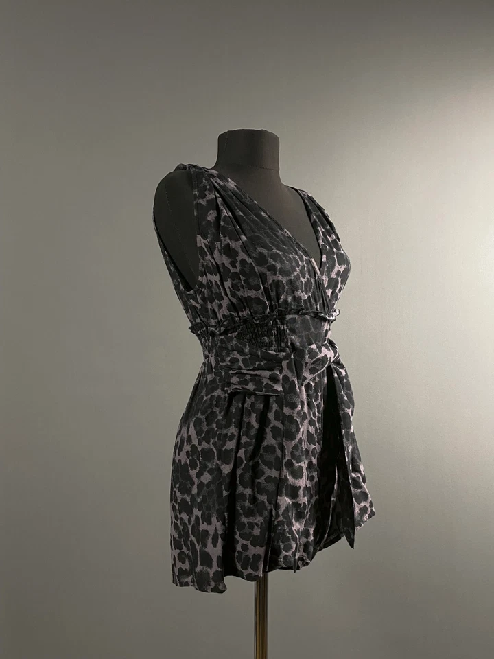 Mono mameluco Free People FP Movement Jog It Off púrpura estampado de leopardo talla XS-S Foto 3 de 4