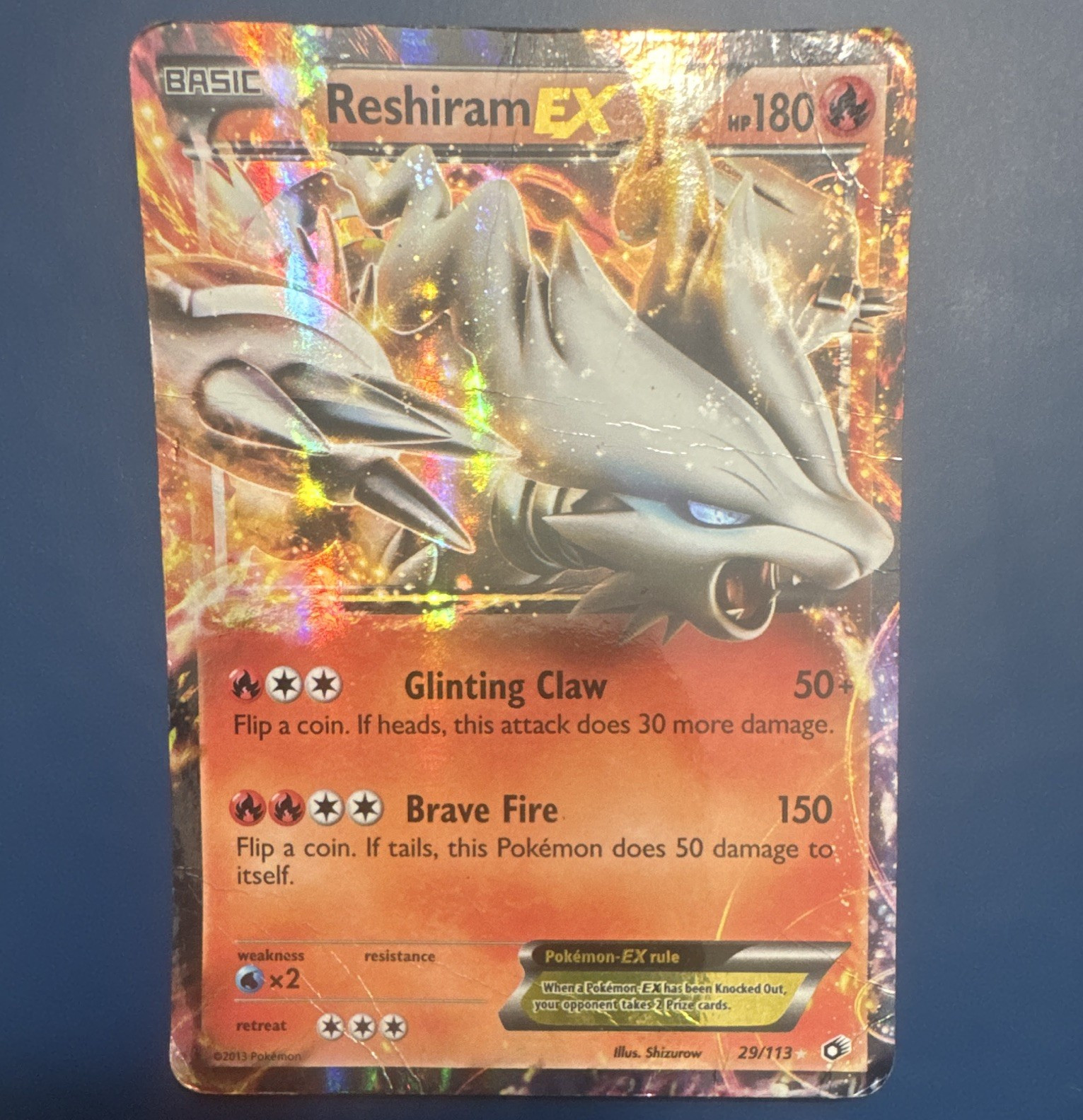 The Pokémon Company Reshiram EX 29/113 Legendary Treasures UR Holo EN worn card