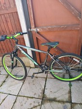 mountain bike junior kids 9-13 make leopard charcoal colour, used but good condi