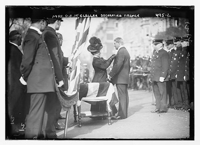 Ellen Mary McClellan,wife of Mayor,decorating honor men,N.Y. Fire Deptartment,