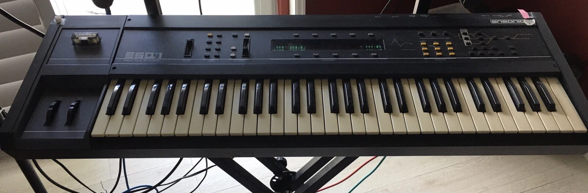 Ensoniq ESQ-1 synthesizer with 5 ROM expansion cards And manual