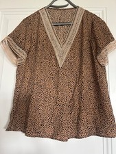 Women's Lace trimmed V neck Sz Small/Medium Top. Sleeves are lace trimmed also