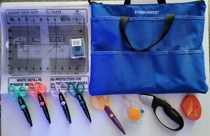 Lot of fiskars paper edges, Bag & Miscellaneous scrapbook accessories.