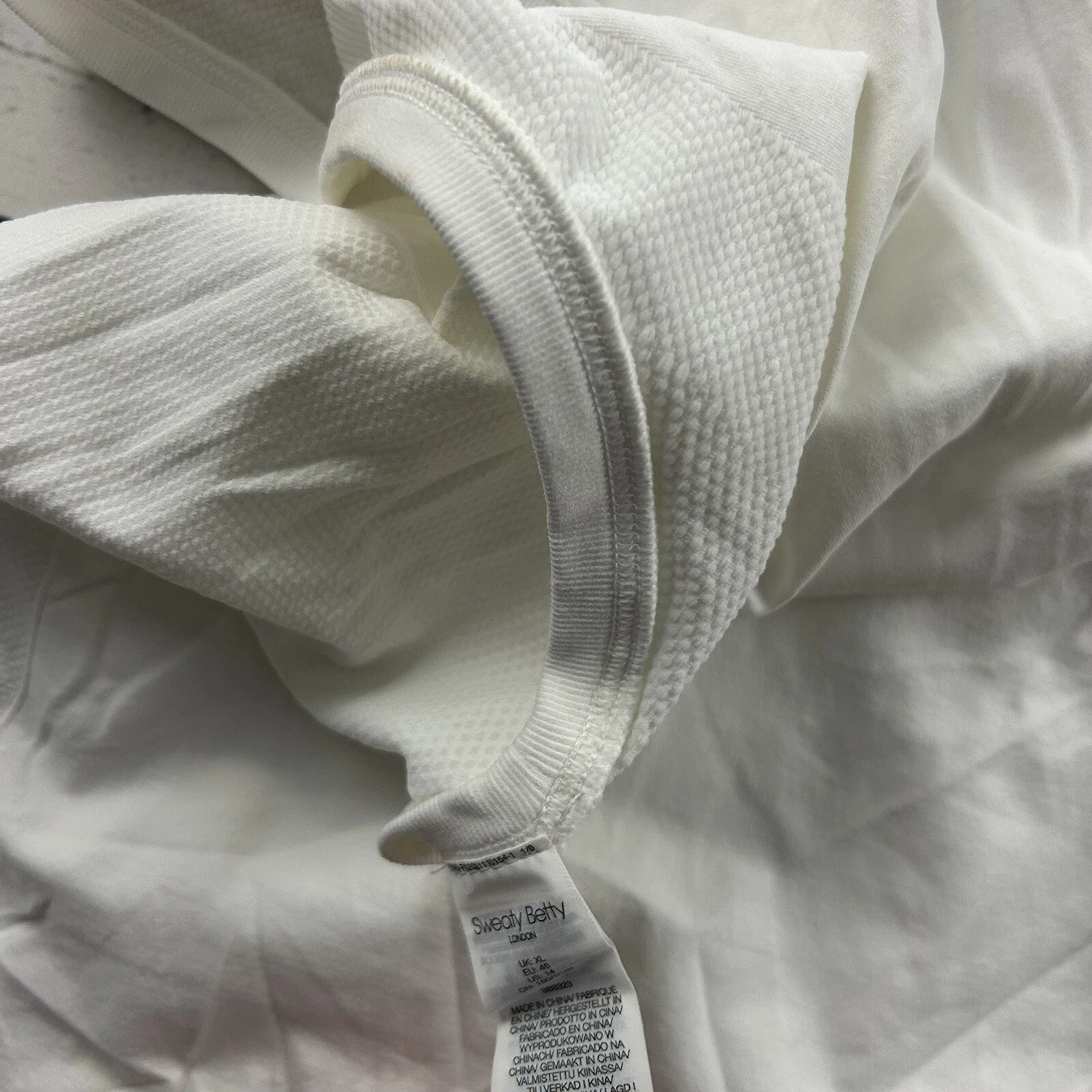 sweaty-betty 1/4 zip sleeveless athletic shirt
