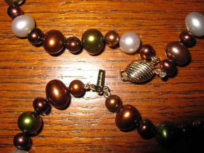 Costco Item for sale: Necklace worn once which is secured with 14kt gold clasp