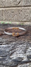 Charriol cable bangle With rose-gold-toned clasp . Unusual Costume Jewellery