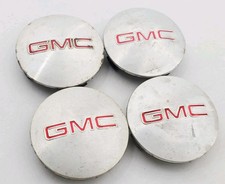 GMC ENVIY ACADIA (4) TAPACUBOS TAPACUBOS TAPACUBOS TAPA CENTRAL ENCHUFE USADO OEM