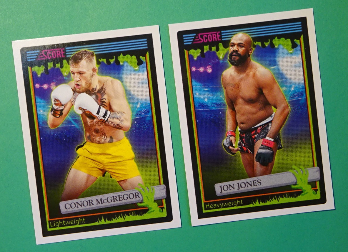 2026 Panini Score a Treat lot CONNOR MCGREGOR #191 & JON JONES #192, UFC/MMA!