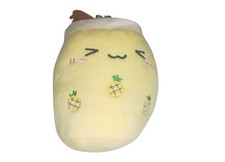 a plush keychaina pineapple-flavored boba tea drink.