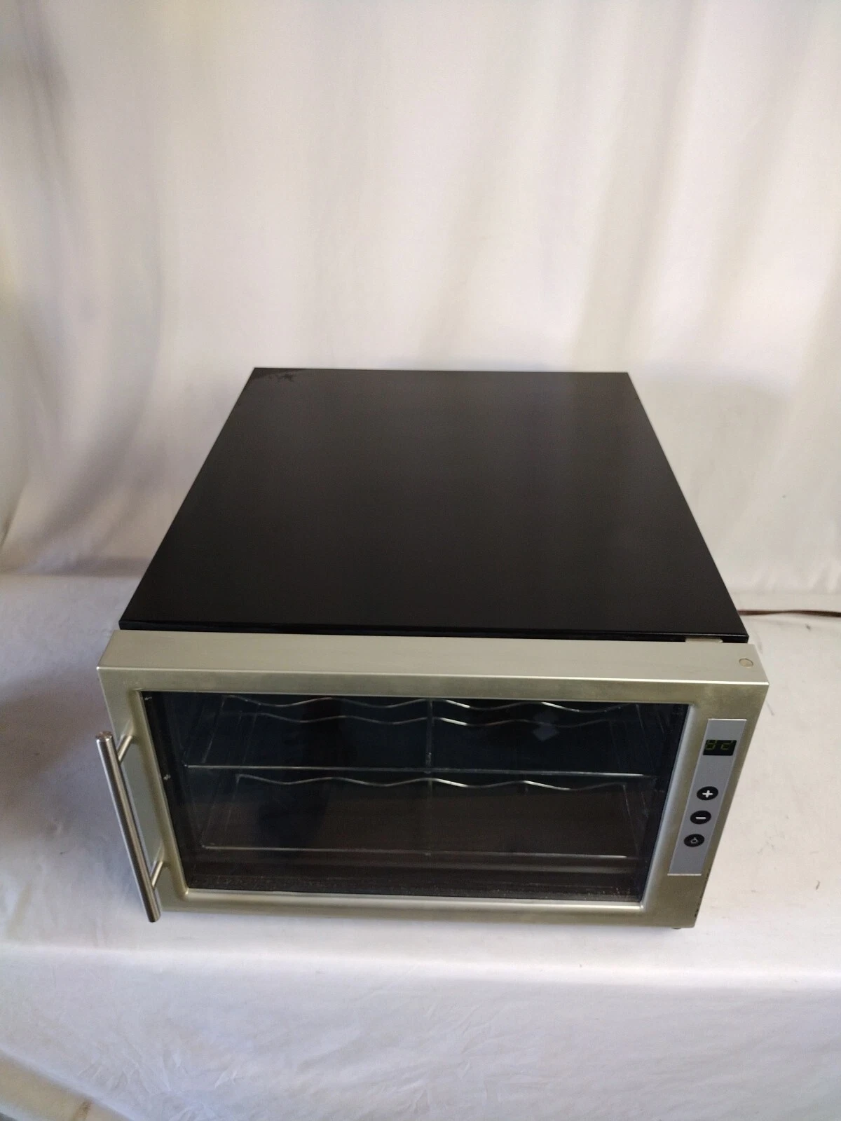 Minea SC-08S 6 Bottle Thermoelectric Wine Fridge Tested Fully Functional.
Opens in a new window or t