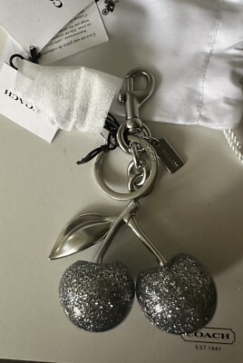 NWT COACH SILVER SPARKLE/SILVER CHERRY CHARM 77840 | eBay