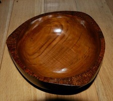Solid Teak Wood. Turmed and carved, one off bowl covered in Cinnamon wood.