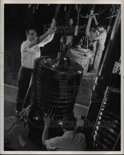 1954 Press Photo Curtiss-Wright J-65 Jet Engine Lowered into Bearing Support